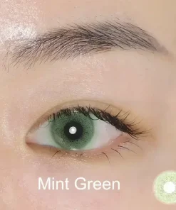 mint green colored contacts wearing detail